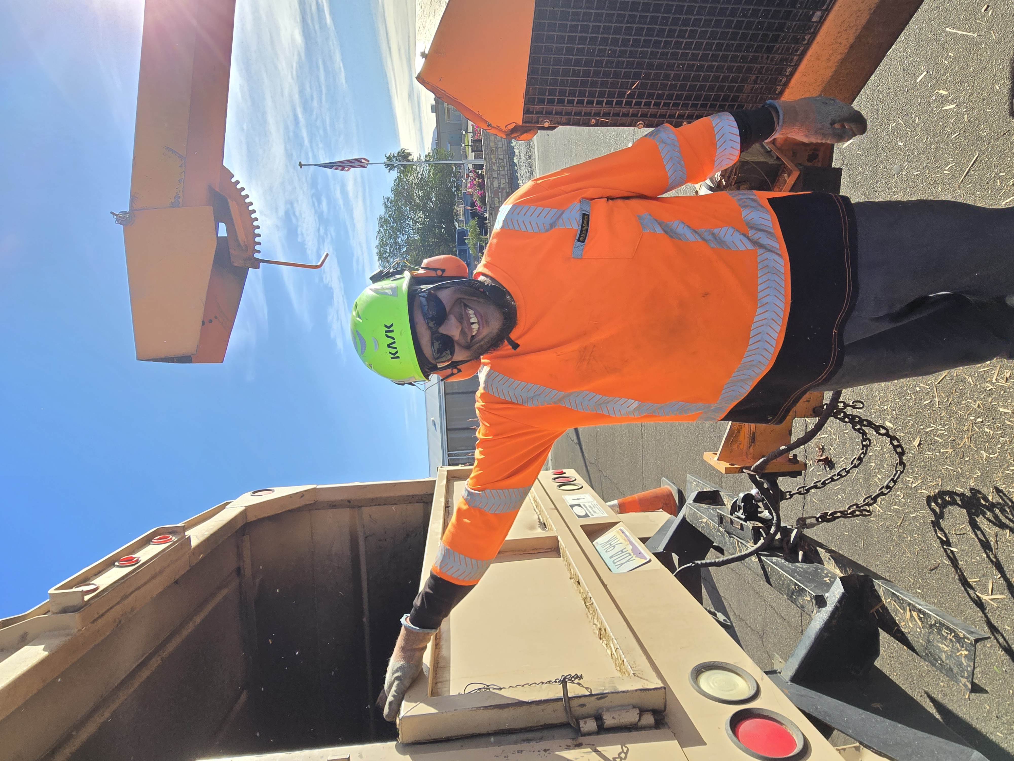 Crew member at a debris handling and cleanup worksite